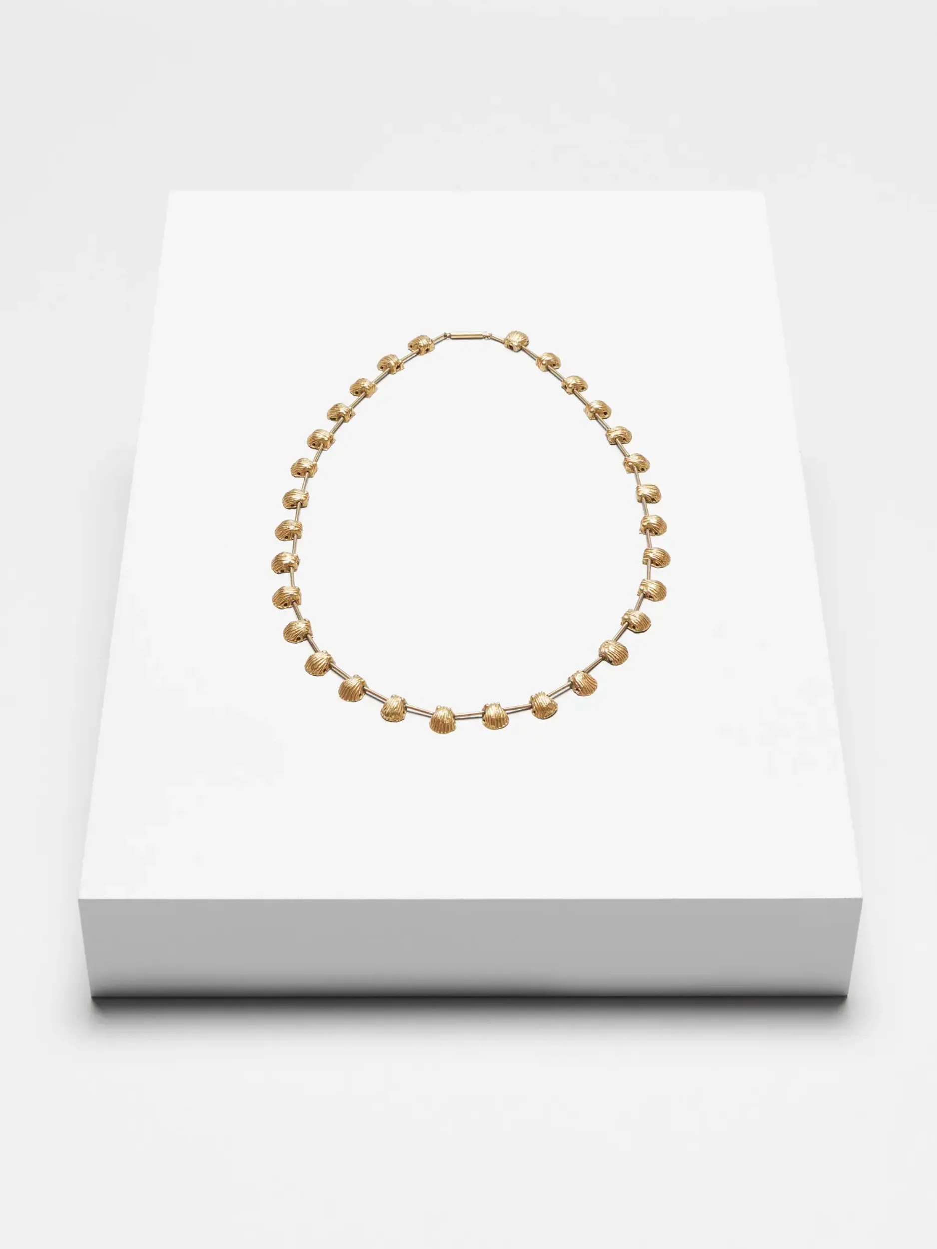 Collana con pendenti a forma di conchiglia